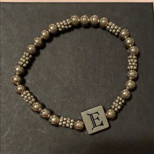 Shiny stretchy kids bracelet with E